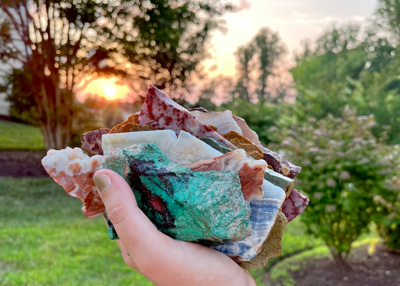 Handful of Rough Rock Lapidary Slabs at Sunset